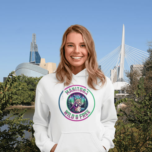 Step into the wild with our Manitoba – Wild & Free hoodie, featuring a striking graphic of a lynx under the glow of the northern lights.